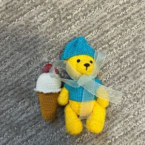 Small bear with ice cream, about 2 inches in size